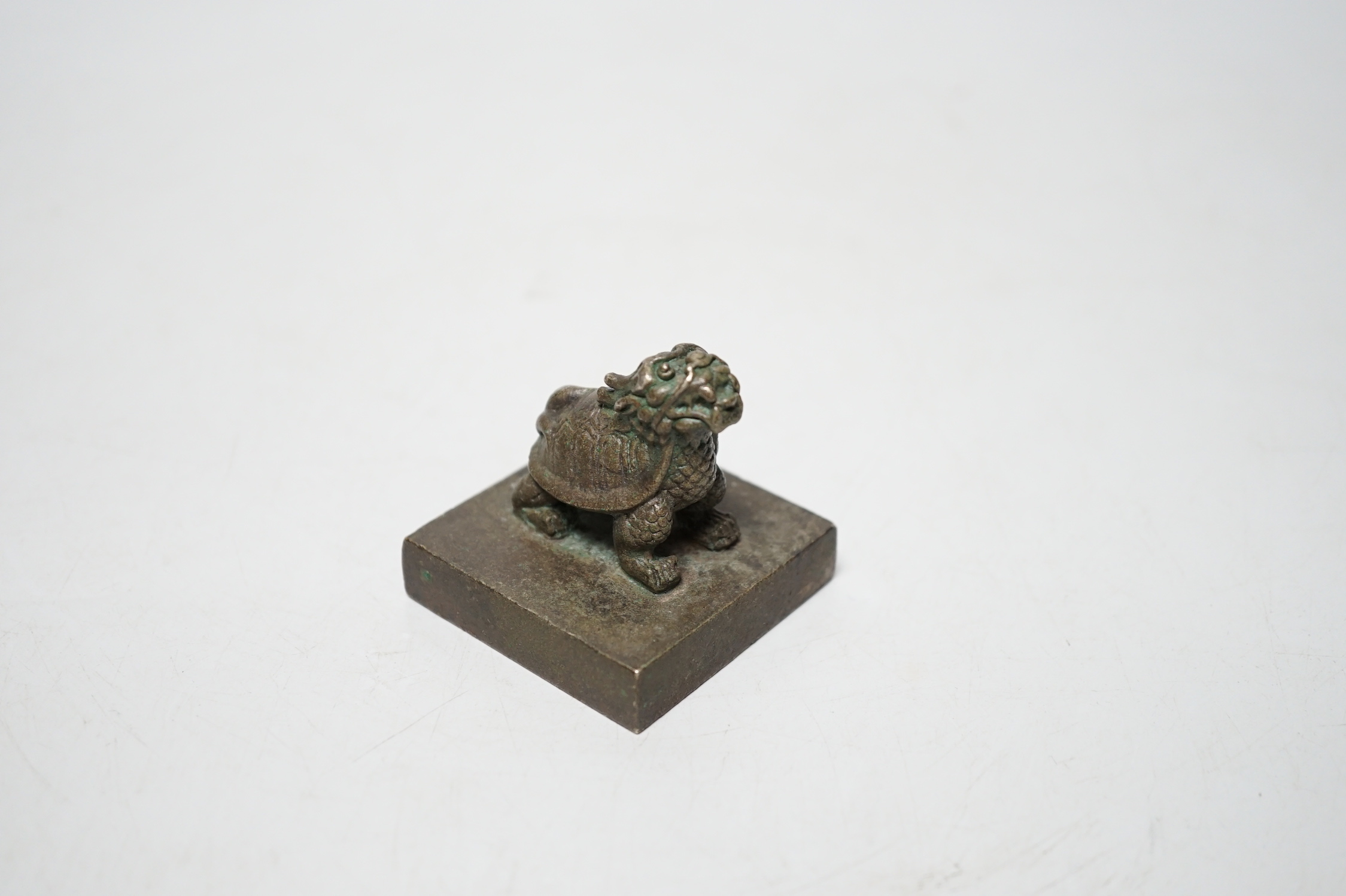 A Chinese bronze ‘Lónggui’ (dragon turtle) seal, 5cm